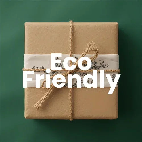 Eco-friendly gift wrapped in brown kraft paper with natural twine and green leaves on label