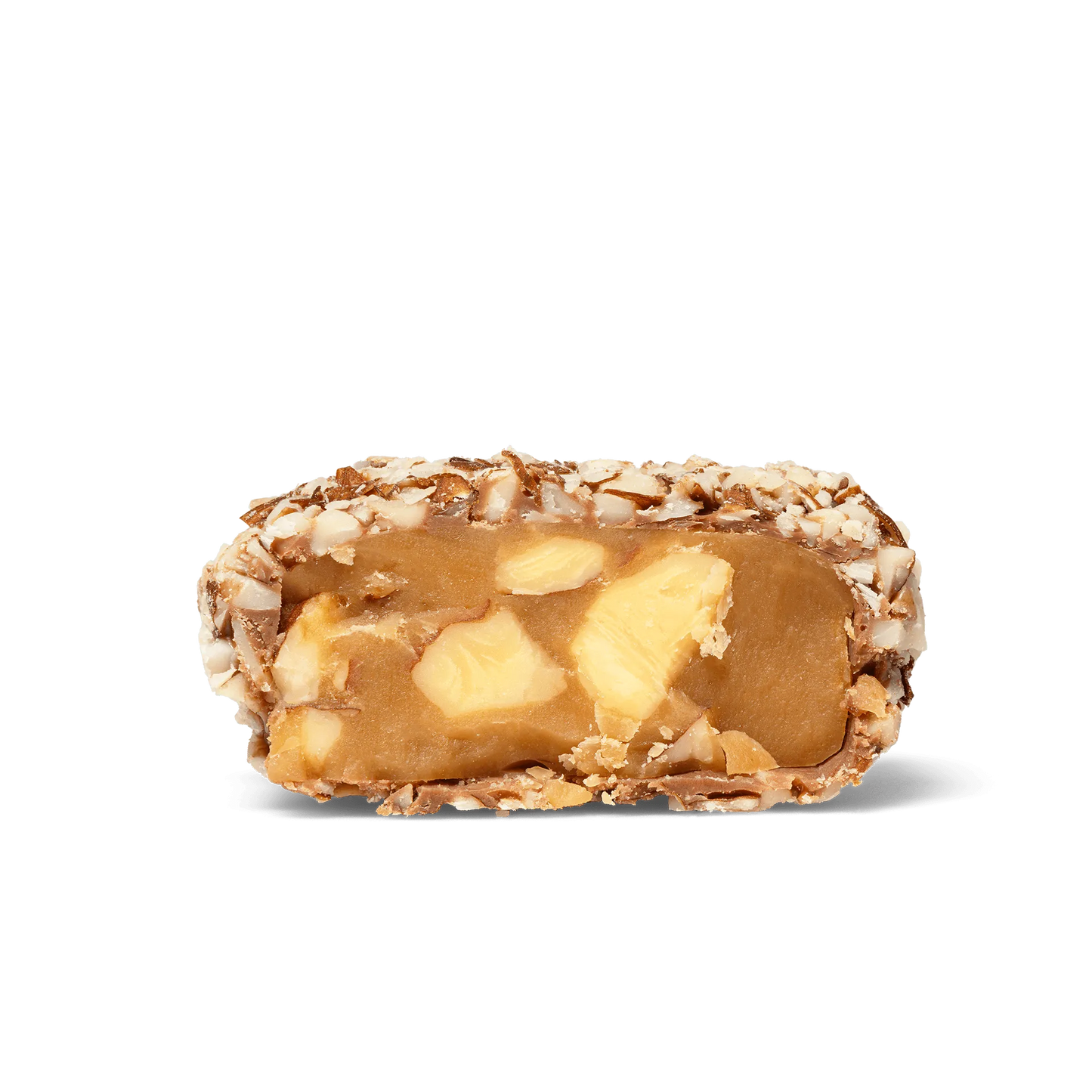 Close-up of a halved candy bar with nuts on a white background
