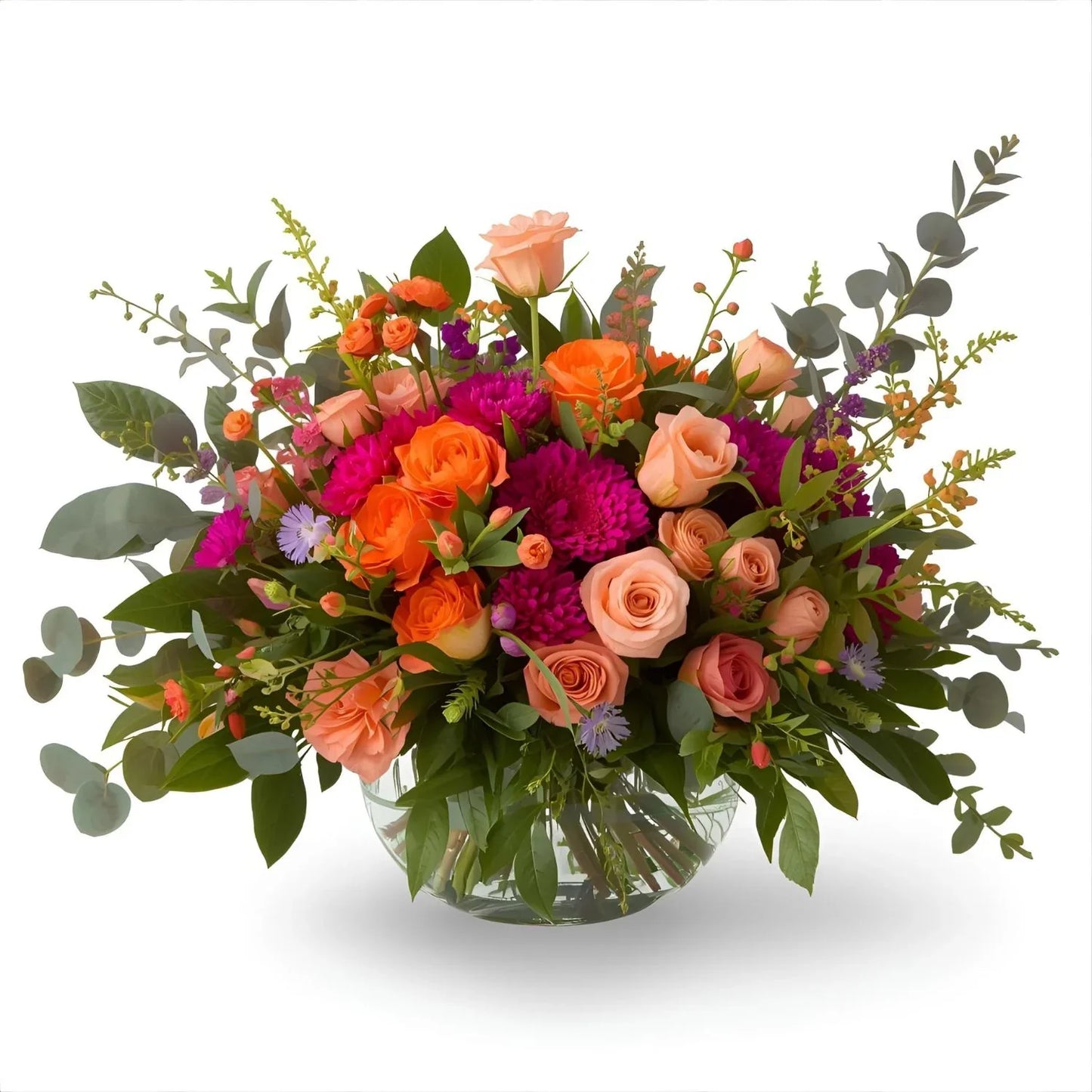 Colorful flower bouquet with orange, pink, and purple flowers in a clear vase on a white background.