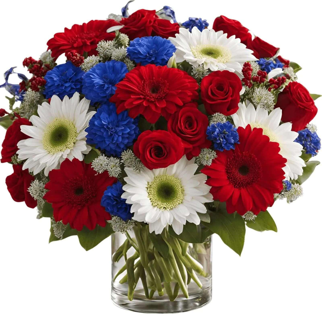 Uplifting patriotic bouquet of red roses, white daisies, and blue flowers in a clear vase