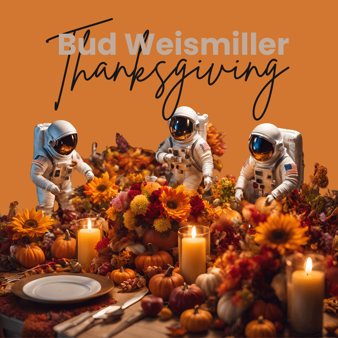 Festive Thanksgiving table with miniature astronauts, pumpkins, flowers, and candles celebrating gratitude