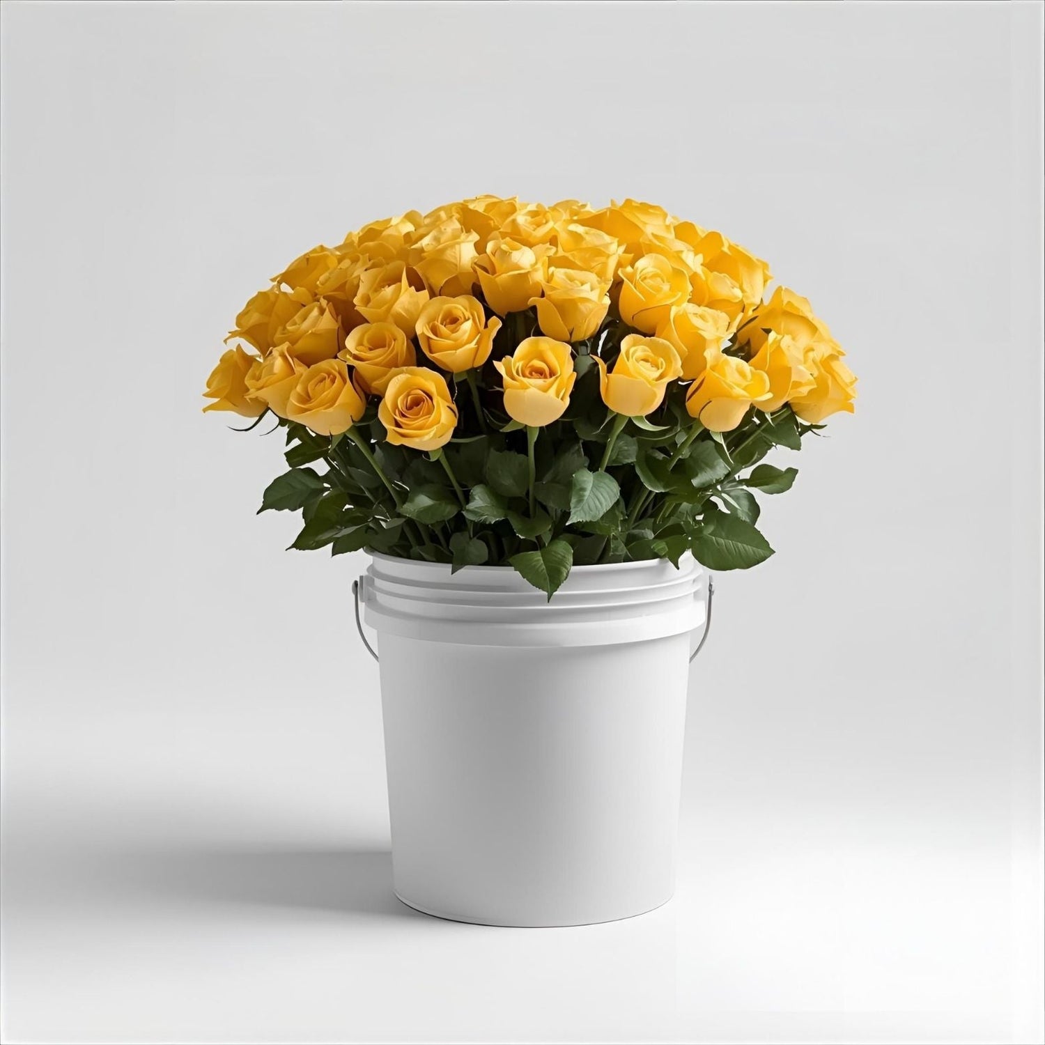 A bucket of 25 yellow flowers for wholesale from Bud Weismiller Flowers Las Vegas.