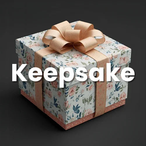 Gift box with floral pattern and bow, labeled 'Keepsake' on a dark background
