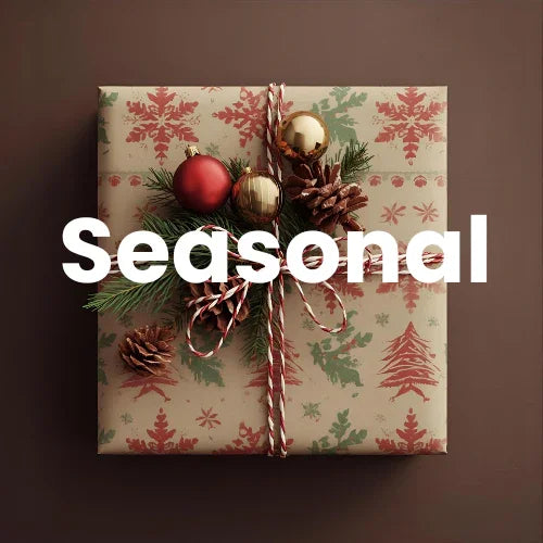 Gift box with Christmas decorations and 'Seasonal' text on a brown background