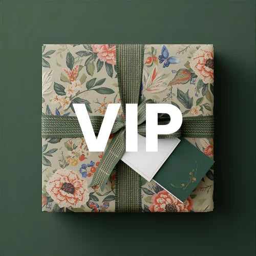 Gift box with floral pattern and 'VIP' text on a dark green background