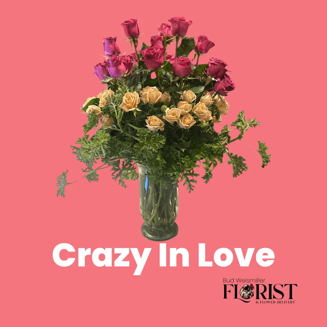 Bud Weismiller's Valentine's Day Bouquet called Crazy in Love featuring pink and champagne, long-stemmed roses and geranium greenery.